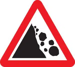 falling rocks road sign