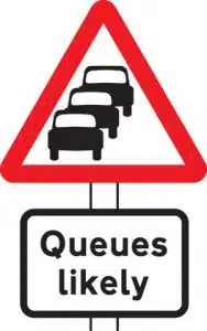traffic queues likely road sign