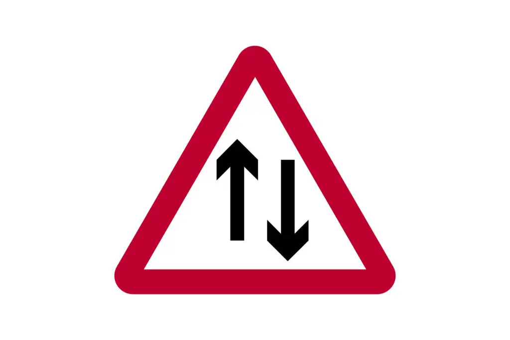 Traffic Crosses One-Way Road Ahead vs Traffic Becomes Two-Way