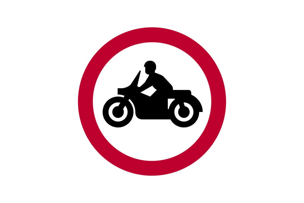 9-no-solo-motorcycles - Driver Training Theory Test A "solo motorcycle" is a standard, two-wheeled motorcycle that does not have a sidecar attached to it. The term "no solo motorcycles" refers to a regulatory sign (Traffic Sign Diagram 619.2 in the UK) that prohibits these types of motorcycles from entering a specific road or area, often to reduce noise, prevent dangerous riding in pedestrian zones, or protect sensitive environments. What is a solo motorcycle? A motorcycle with two wheels and no attached sidecar. It is distinct from a motorcycle combination (which has a sidecar) or other vehicles. What does "No solo motorcycles" mean? It is a specific road sign that prohibits solo motorcycles from entering a designated area or route. The sign typically shows a motorcycle icon within a red circular border. Why would this restriction be in place? Noise and nuisance: To prevent noise pollution from motorcycle engines in quiet areas. Safety: To keep motorcycles out of areas with high pedestrian traffic, like pedestrian zones. Environmental protection: To protect ecologically sensitive areas from damage by vehicles. Traffic management: To regulate traffic flow on certain roads, keeping them clear for other vehicles or types of traffic. How it differs from other "no vehicles" restrictions: The "No solo motorcycles" sign is specific to solo motorcycles, allowing other vehicles (like cars) to pass, unlike a general "No vehicles" sign. Sometimes, it's used in conjunction with other restrictions; for example, a supplementary plate may indicate that solo motorcycles are allowed at certain times or under specific conditions.