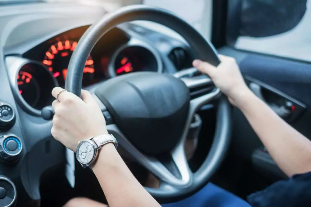 A novice driver is able to steer a straight course. How could you help them improve their steering skills