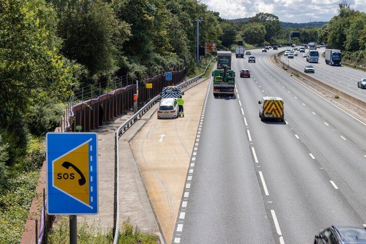 you have stopped in an emergency area. what must you do before you rejoin the carriageway