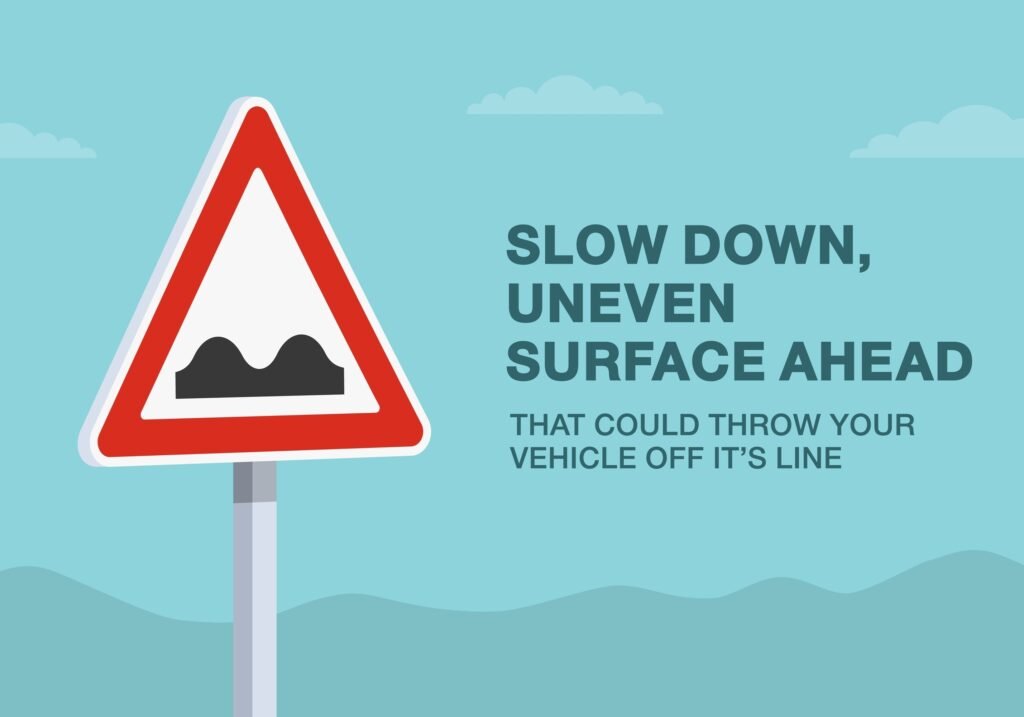 uneven road sign for uk theory test